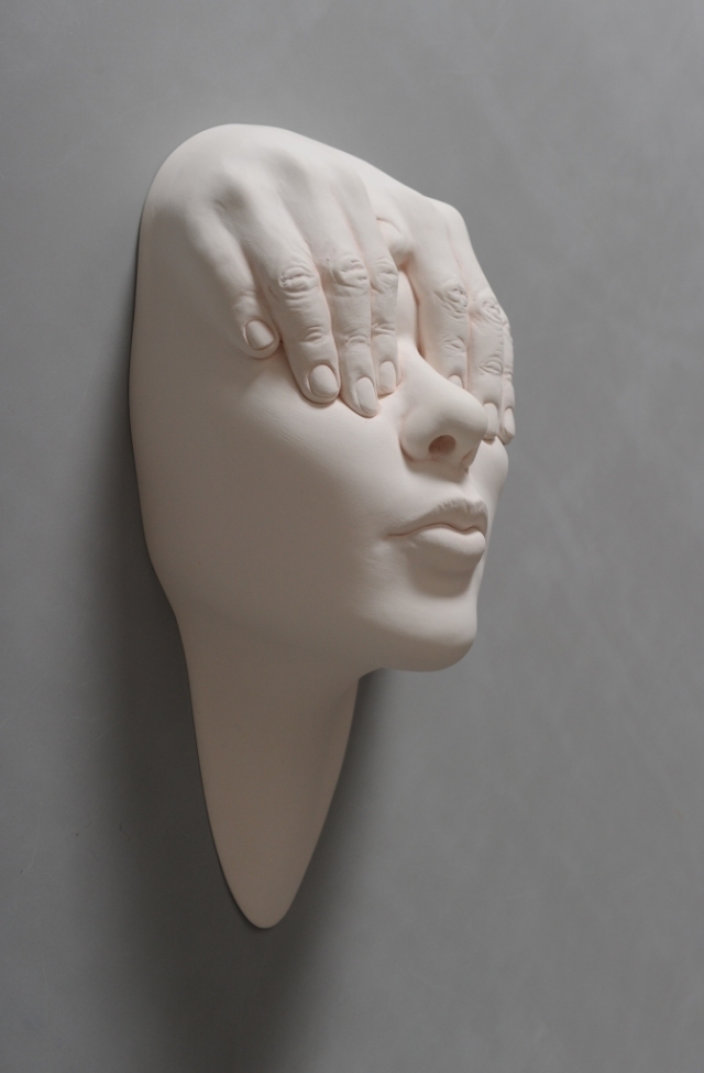 Porcelain Face Sculptures by Johnson Tsang